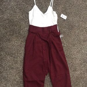 Formal romper. Never worn. Brand new with tags.